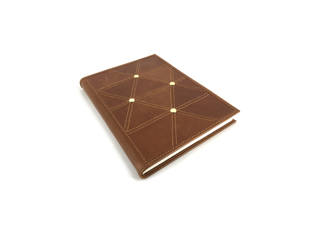 Leather Journal with cut and punch design,
size 6 X 8 inch with mill made paper