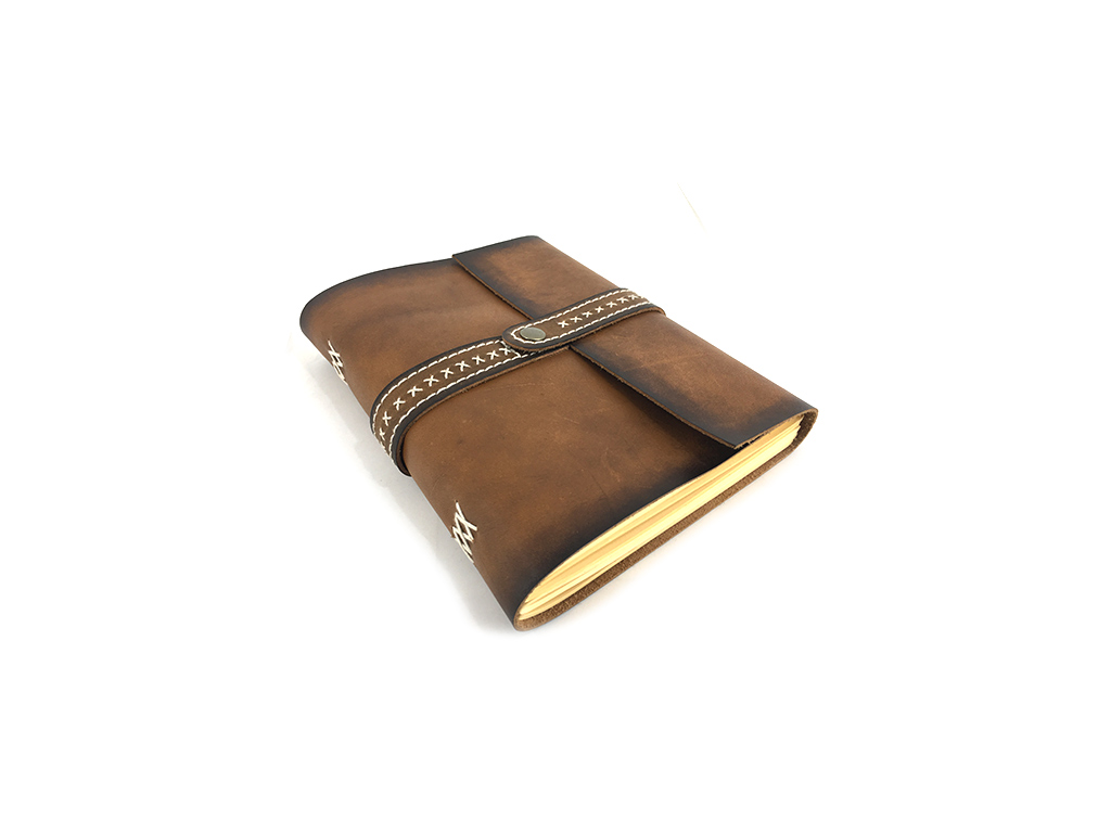 Leather journal with strap closure,
size 6 X 8 inch with mill made paper