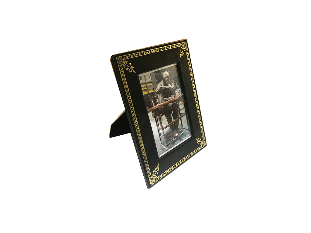 Photo frame with golden design