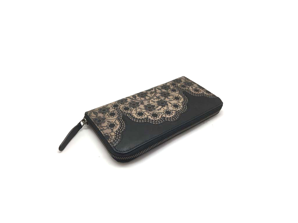 Zipper around leather wallet with embossed design